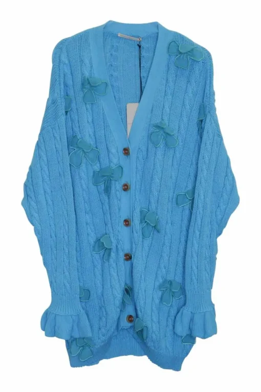 Blue cotton cable-knit button-front cardigan with flounce cuffs and tonal floral appliqués