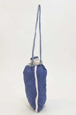Blue embellished abstract jacquard drawstring shoulder bag with contrast bead broderie appliqué