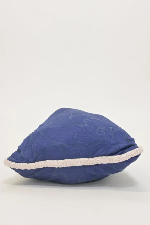 Blue embellished abstract jacquard drawstring shoulder bag with contrast bead broderie appliqué