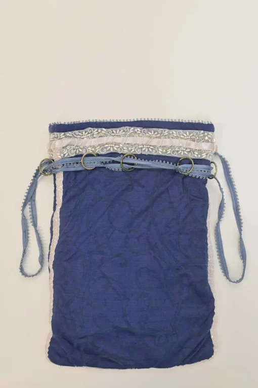 Blue embellished abstract jacquard drawstring shoulder bag with contrast bead broderie appliqué