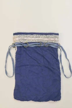 Blue embellished abstract jacquard drawstring shoulder bag with contrast bead broderie appliqué