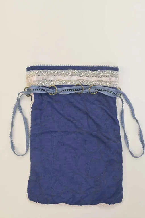 Blue embellished abstract jacquard drawstring shoulder bag with contrast bead broderie appliqué