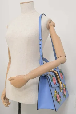 Blue floral-embroidered leather Sylvie web top handle bag with detachable shoulder strap