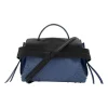 Blue leather bag with black flap and studs at corners, comes with shoulder strap