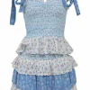 Blue paneled shirred cotton floral print two-piece set featuring ribbon-trap bustier top and tier ruffle drop-waist mini skirt