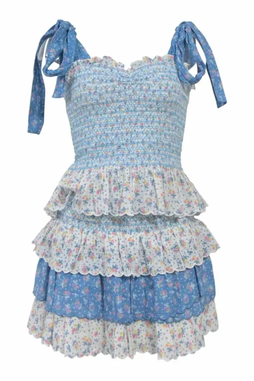 Blue paneled shirred cotton floral print two-piece set featuring ribbon-trap bustier top and tier ruffle drop-waist mini skirt
