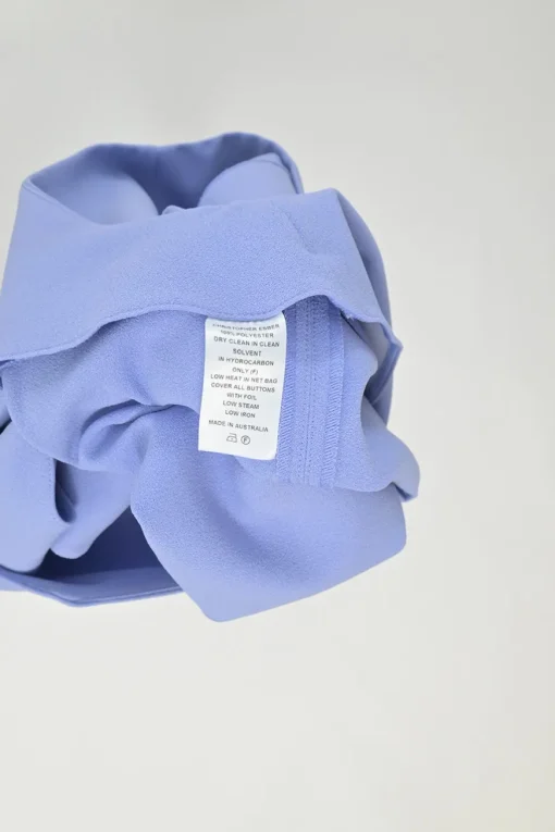 Blue polyester swing-style button-back Y-collar top and mini skirt two-piece set
