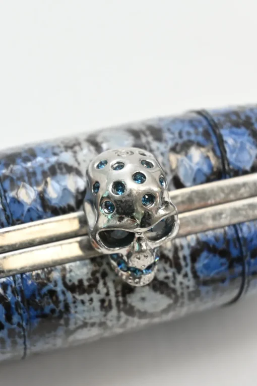 Blue snakeskin embellished skull minaudière box crossbody clutch with silver-tone metallic hardware