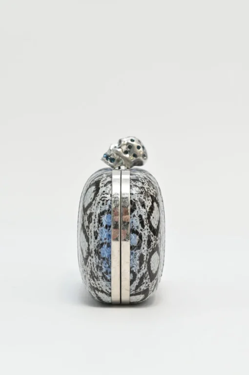 Blue snakeskin embellished skull minaudière box crossbody clutch with silver-tone metallic hardware
