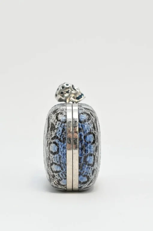 Blue snakeskin embellished skull minaudière box crossbody clutch with silver-tone metallic hardware