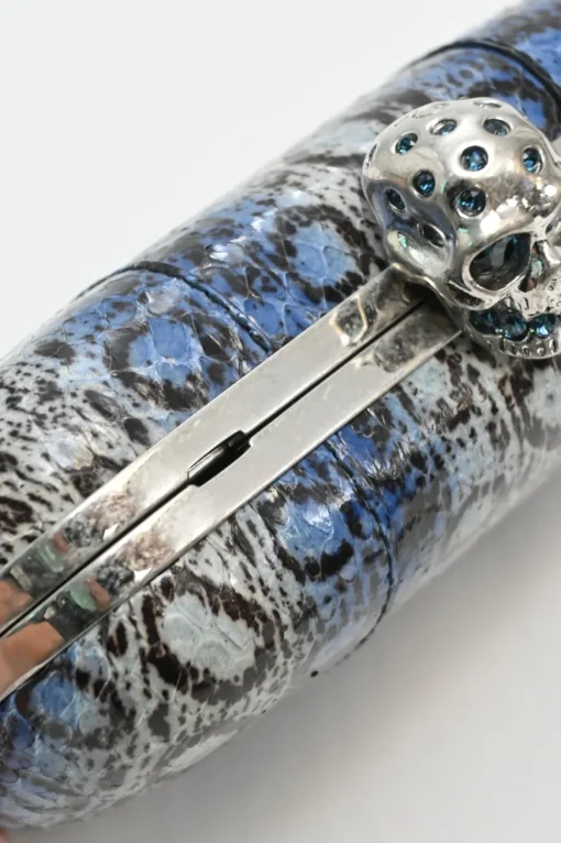 Blue snakeskin embellished skull minaudière box crossbody clutch with silver-tone metallic hardware