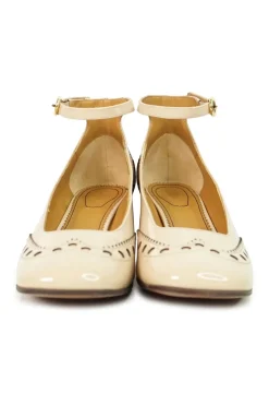 Blush brogued patent leather and leather block heel Mary Jane pumps with adjustable buckle ankle strap