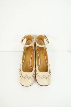 Blush brogued patent leather and leather block heel Mary Jane pumps with adjustable buckle ankle strap