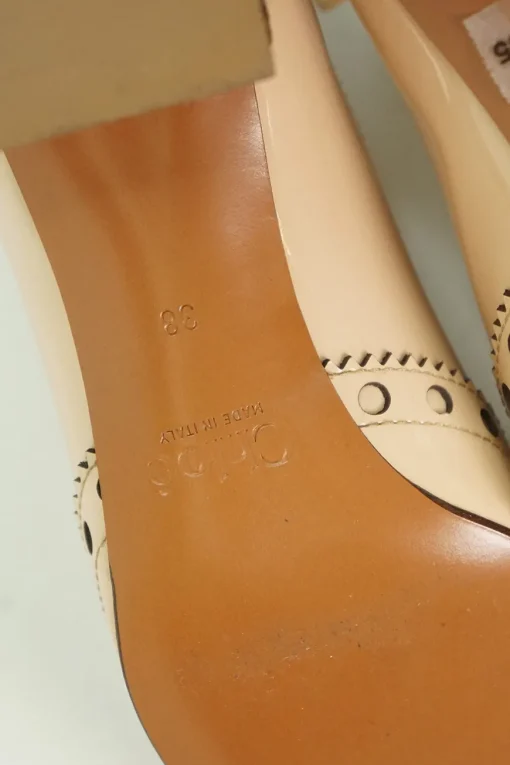 Blush brogued patent leather and leather block heel Mary Jane pumps with adjustable buckle ankle strap