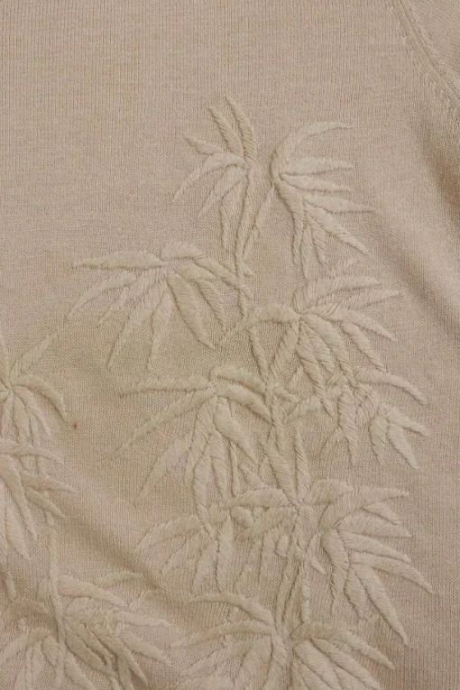 Blush cotton Qipao-style pullover cap sleeve knit top featuring bamboo broderie motif