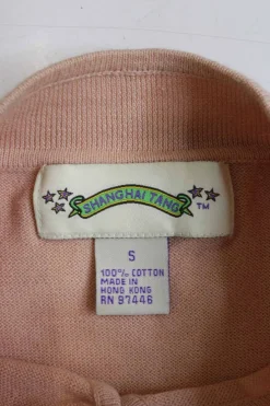 Blush cotton Qipao-style pullover cap sleeve knit top featuring bamboo broderie motif