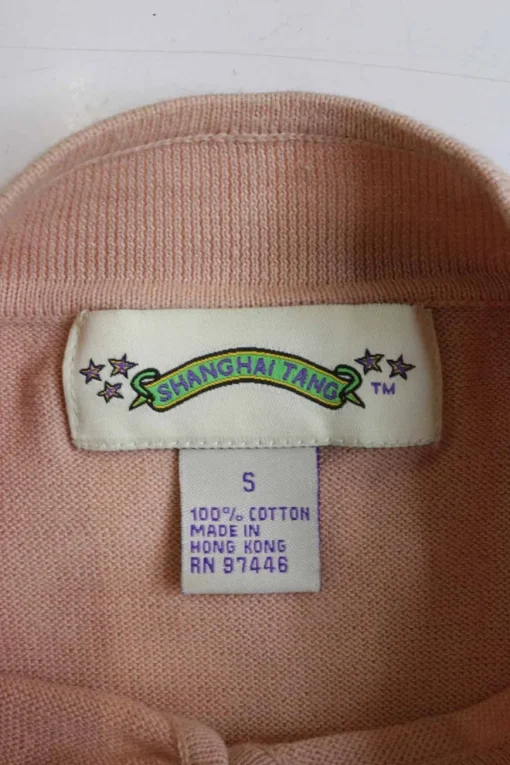 Blush cotton Qipao-style pullover cap sleeve knit top featuring bamboo broderie motif