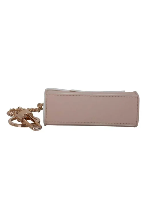 Blush leather macro bag key chain with rose gold metal chain and clipper