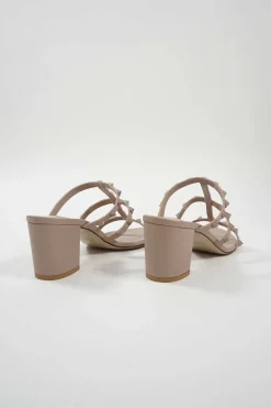 Blush leather Rockstud mule sandals