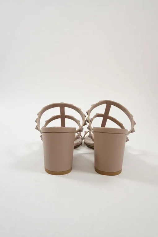 Blush leather Rockstud mule sandals