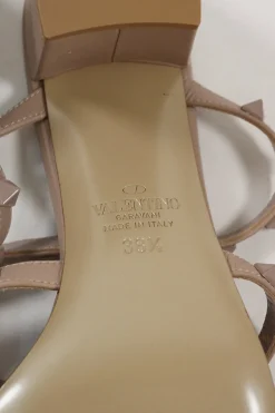 Blush leather Rockstud mule sandals