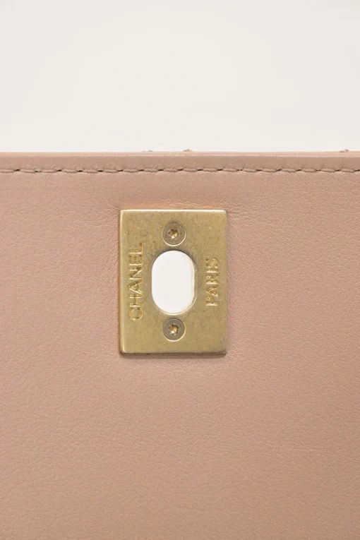 Blush matelassé calfskin mini pearl chain flap bag
