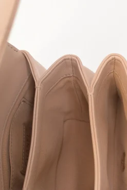Blush matelassé calfskin mini pearl chain flap bag