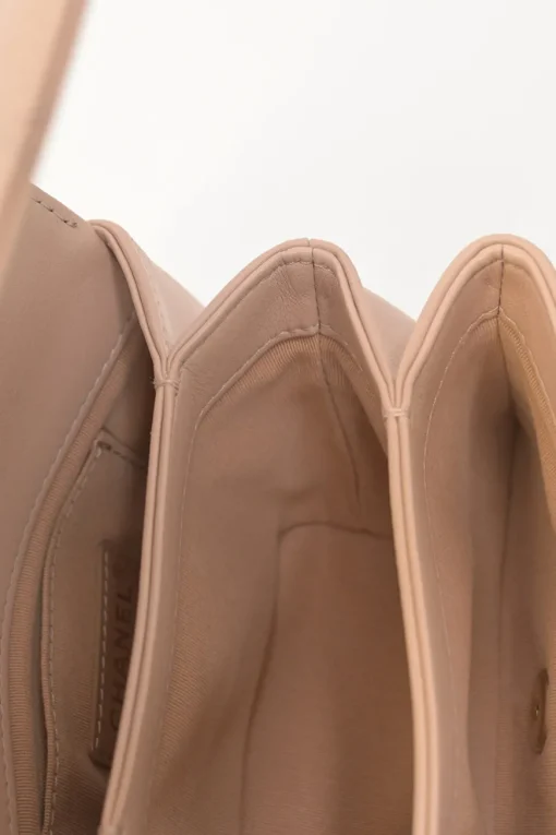 Blush matelassé calfskin mini pearl chain flap bag