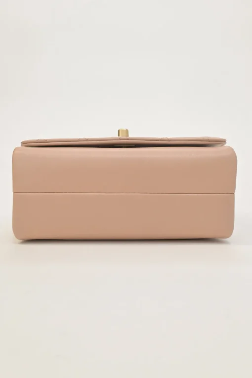 Blush matelassé calfskin mini pearl chain flap bag