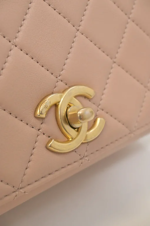 Blush matelassé calfskin mini pearl chain flap bag