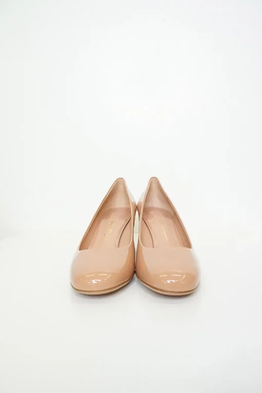 Blush peach almond toe pumps with a stacked gold-tone sculpted block heel