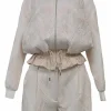 Blush polyester-blend brocade two-piece set featuring peplum bomber jacket and tailored shorts
