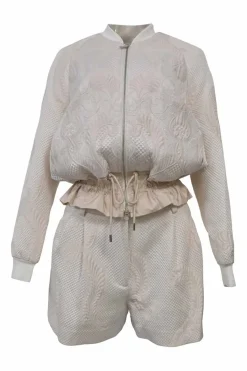 Blush polyester-blend brocade two-piece set featuring peplum bomber jacket and tailored shorts