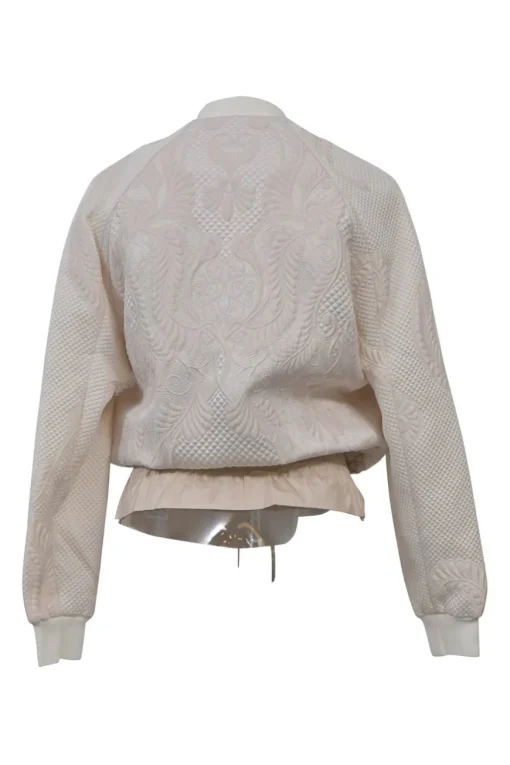 Blush polyester-blend brocade two-piece set featuring peplum bomber jacket and tailored shorts