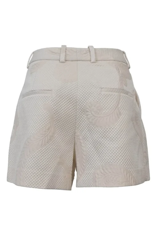Blush polyester-blend brocade two-piece set featuring peplum bomber jacket and tailored shorts