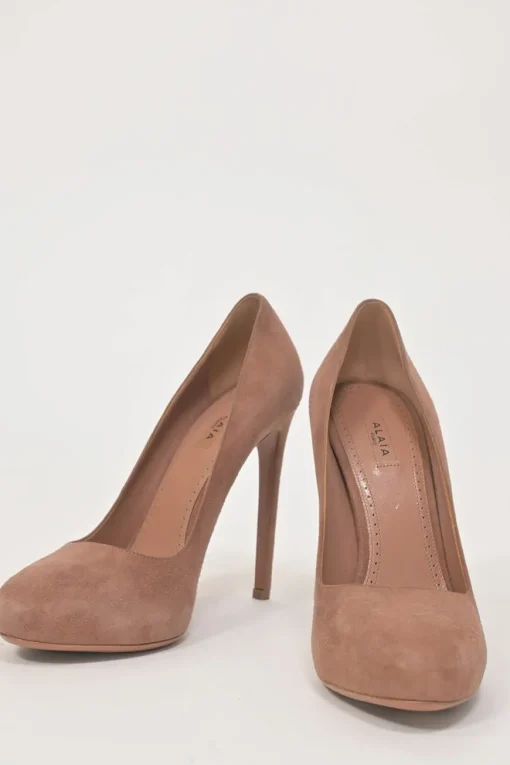 Blush suede round-toe platform pumps