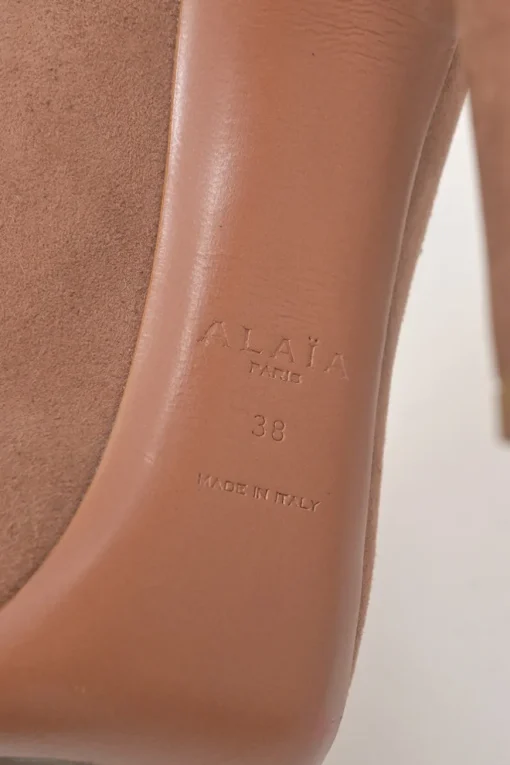 Blush suede round-toe platform pumps
