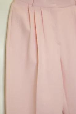 Blush wool-silk blend high-rise pleated crop tapered leg trousers