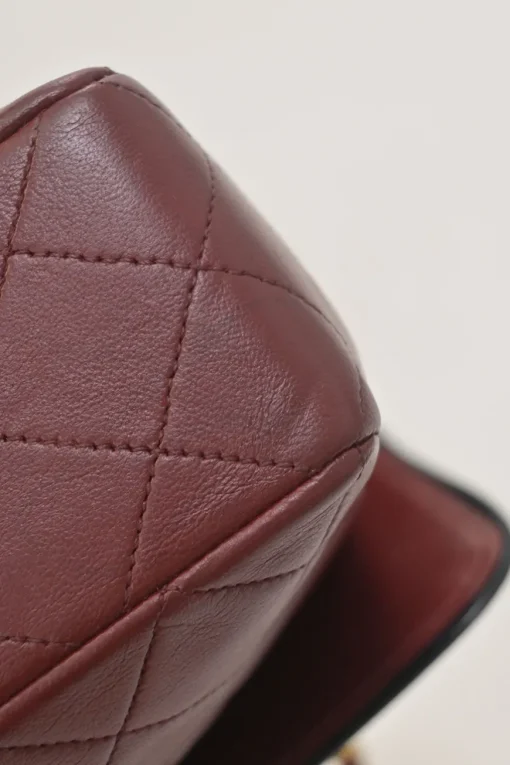 Bordeaux matelassé lambskin CC flap shoulder bag with with 24-karat gold-plated hardware