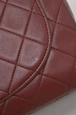 Bordeaux matelassé lambskin CC flap shoulder bag with with 24-karat gold-plated hardware