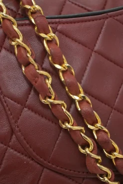 Bordeaux matelassé lambskin CC flap shoulder bag with with 24-karat gold-plated hardware