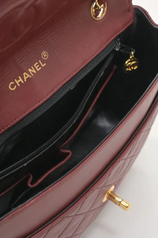 Bordeaux matelassé lambskin CC flap shoulder bag with with 24-karat gold-plated hardware