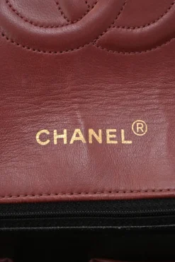 Bordeaux matelassé lambskin CC flap shoulder bag with with 24-karat gold-plated hardware