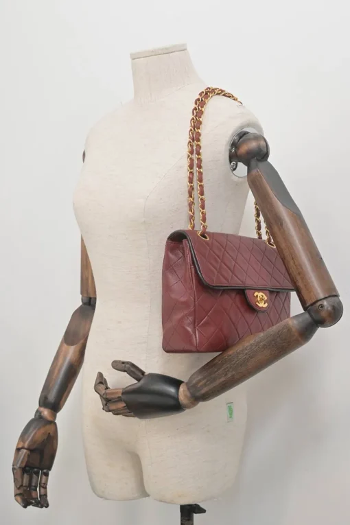 Bordeaux matelassé lambskin CC flap shoulder bag with with 24-karat gold-plated hardware