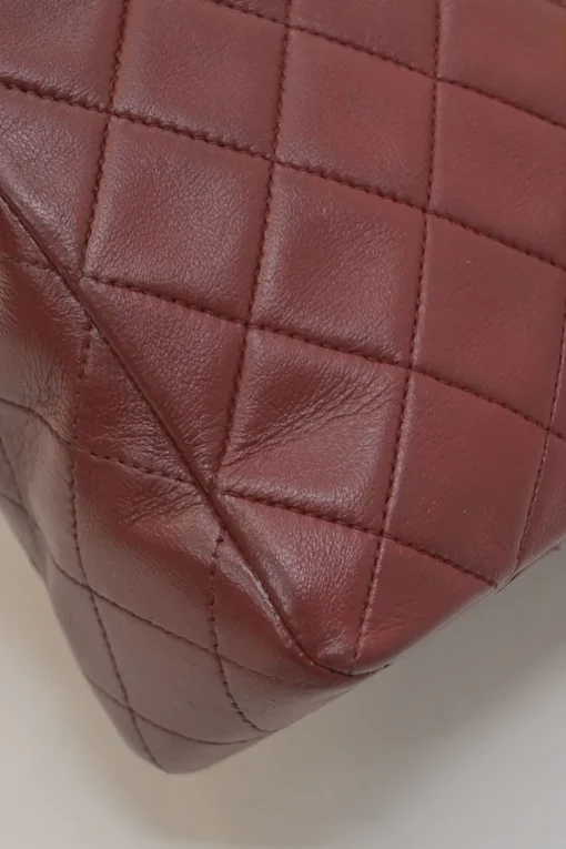Bordeaux matelassé lambskin CC flap shoulder bag with with 24-karat gold-plated hardware