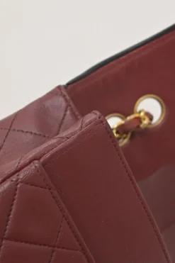 Bordeaux matelassé lambskin CC flap shoulder bag with with 24-karat gold-plated hardware