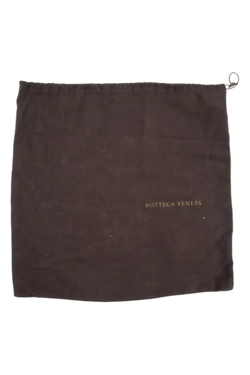 Bottega Veneta soft top handle bag in black python leather, stitching details and with a woven single handle