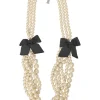 Bow-embellished resin multi-strand faux pearl necklace with lobster clasp closure