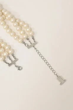 Bow-embellished resin multi-strand faux pearl necklace with lobster clasp closure