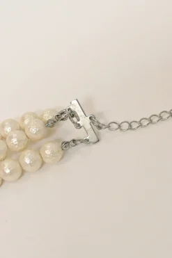 Bow-embellished resin multi-strand faux pearl necklace with lobster clasp closure
